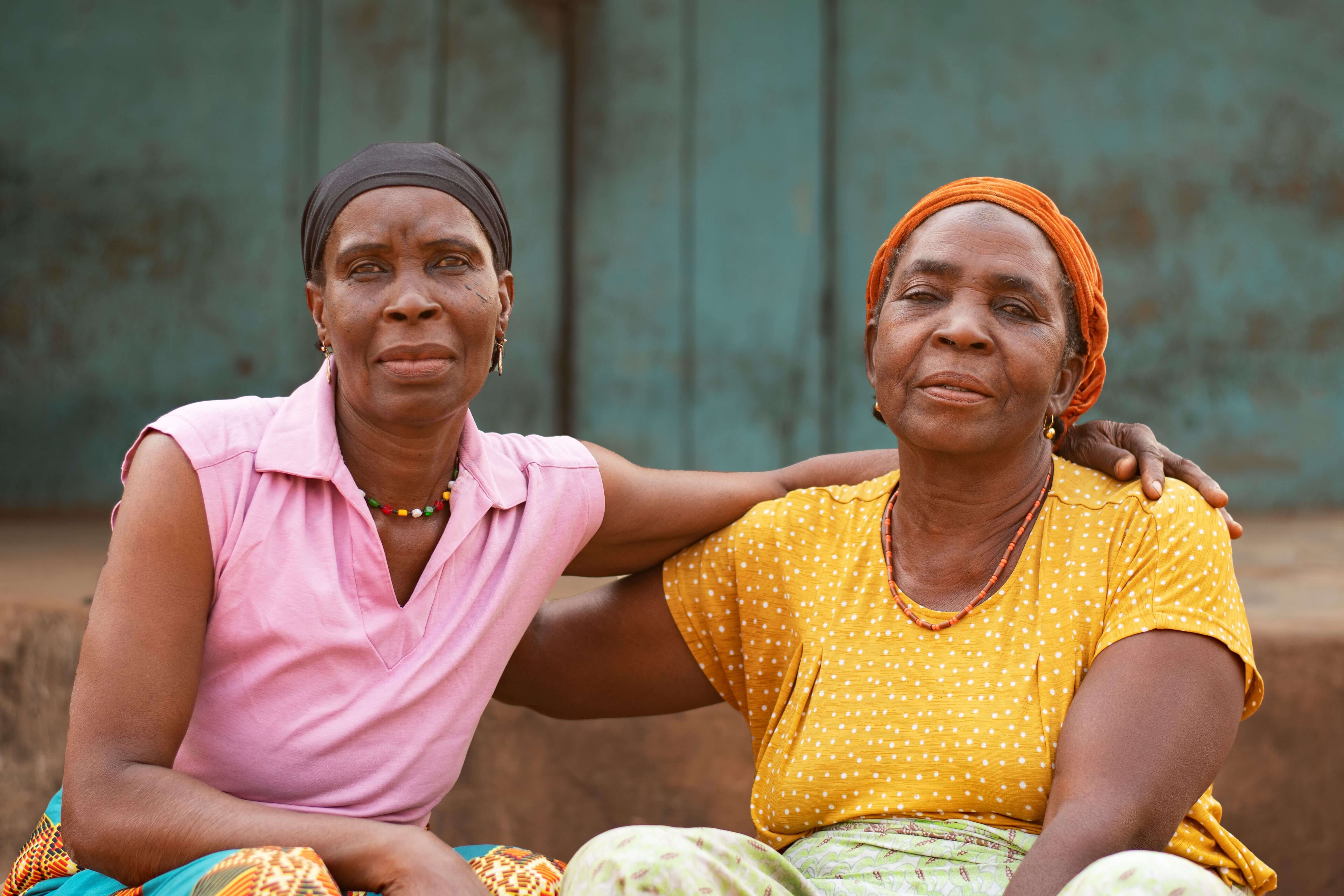 medium-shot-african-women-sitting-together (1) medium-shot-african-women-sitting-together (1)